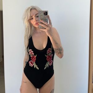 Body suit with flower design